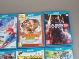 four wii games that are on the table