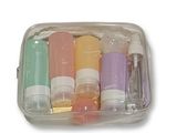 a plastic container filled with toothbrushes and toothpaste