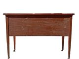 an old school desk with a wooden top and metal legs