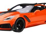 the toy car is orange and has black stripes on it