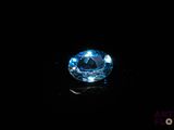 an image of a blue diamond on a black surface