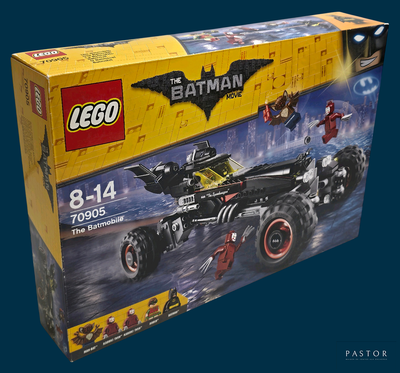 lego batman batmobile set in a box on a blue background