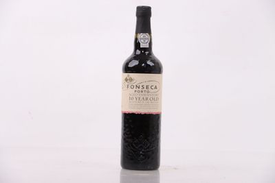 a bottle of wine that is sitting on a table