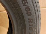 tire tread of a car on a cardboard box with a cardboard box in the background