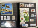 a picture of a picture of a book with stamps on it
