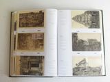 an open book with pictures of buildings on it