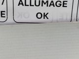 an image of a close up of a label on a refrigerator