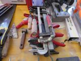 many tools on a table that are sitting on the table