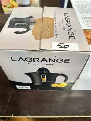 emballage d'une cafetière Lagrange posée sur une table