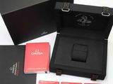 an image of a black box with a red card and a black watch