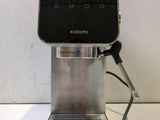 a coffee machine that is sitting on a counter