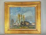 une peinture à l'huile d'un paysage avec des arbres dans un cadre doré