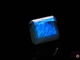an image of a square blue stone in the dark