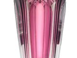 purple glass vase on white background with reflection of light