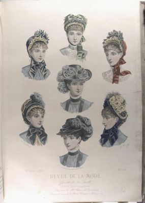 an old book with a bunch of women ' s hats on top of it