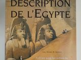 the book description del egypte by napoleon bonparte is sitting on a table