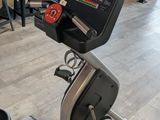 an image of a stationary exercise bike in a gym room
