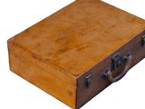 a brown suitcase with a handle on a white background