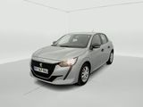 une voiture argentée dans une pièce blanche au sol blanc