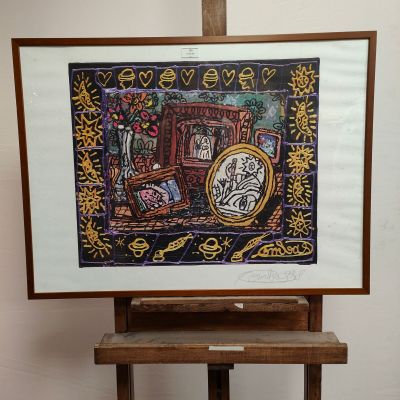 a picture of an easel with a painting on it
