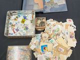 many different types of stamps on the table