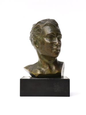 bronze bust of a young man on a marble base
