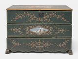 a green chest of drawers with a painting on it