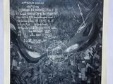 an old black and white photo of a map of a city