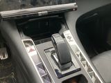 an image of a car dashboard with a cell phone in the center