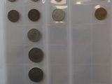 a lot of coins in a plastic bag on the table