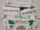 une pile de rouleaux de papier toilette empilés les uns sur les autres