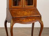 an image of a small desk with a glass door on top