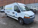 a white van that is parked in front of a building