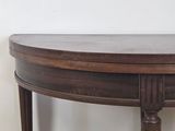 an image of a wooden table with a curved top