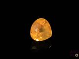 a yellow diamond on a black background