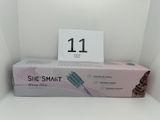 a box of toothbrushes on a shelf in the corner