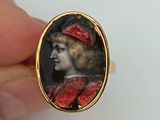 an image of a miniature portrait of a woman wearing a red hat