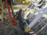 a ladder that is sitting next to a pile of equipment