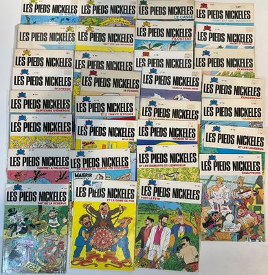 several comics are stacked on top of each other on a table