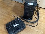 two speakers that are connected to each other on the floor