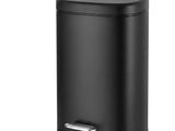 a black trash can with the lid open on a white background