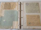 an open book with a lot of old papers on it