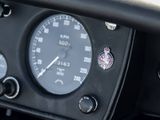 a close up of a speedometer in the dashboard of a car