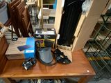 a table with a bunch of items on it in a room