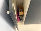 a toilet that is in the corner of a room