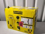 a box of a yellow and black radio sitting on top of a table