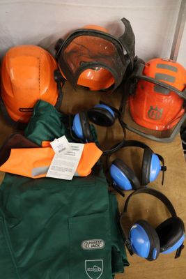 many different types of safety equipment laid out on the floor