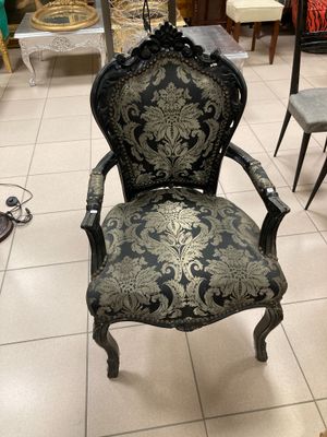 a chair that is sitting on the floor in a room