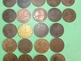 a lot of coins that are on a green surface