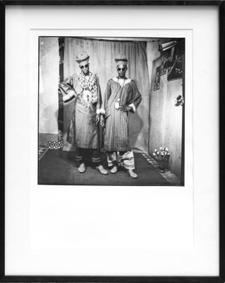 black and white photograph of two women standing next to each other